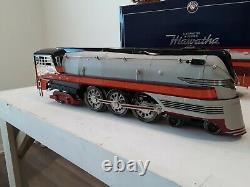 Lionel standard gauge Hiawatha loco and tender with 4 passenger cars in box