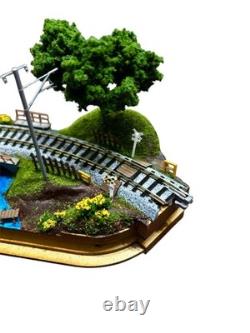 N gauge model train layout with landscape kato #bfb55c