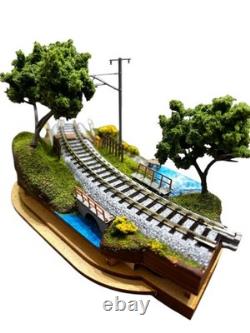N gauge model train layout with landscape kato #bfb55c